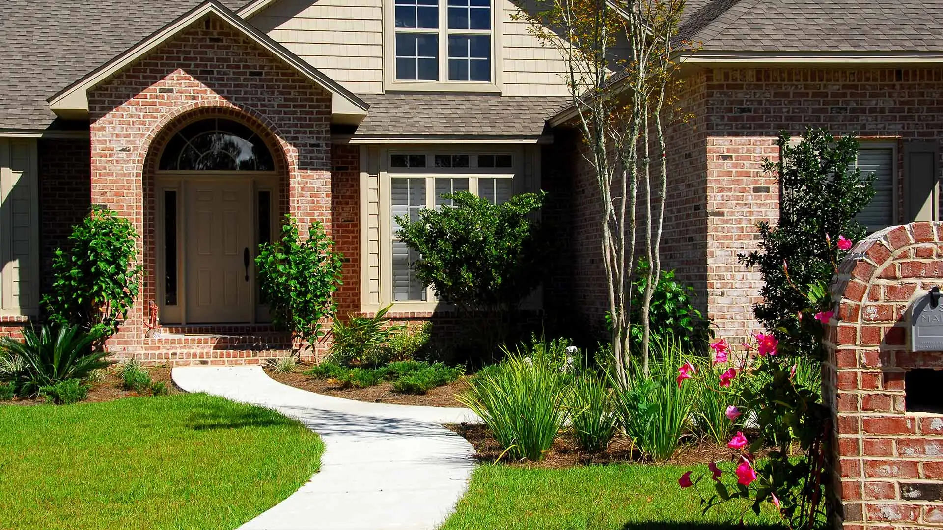 The path to the front door of this home represents the pathway towards good communication with clients.