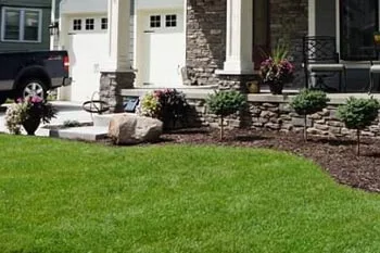 Troy home that receives ongoing fertilization and weed control by our professional technicians.